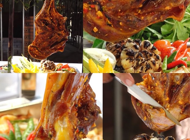 đặt thịt dê nướng lên giá treo có bày rau củ bên dưới